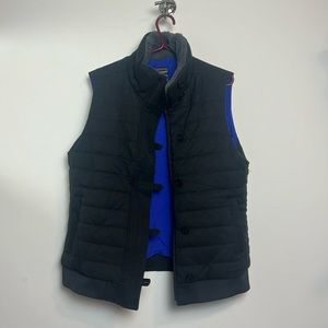 Patagonia women’s XL navy blue vest with Sherpa trim around collar